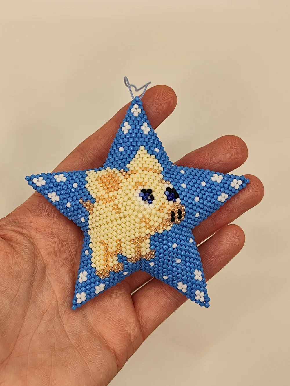 Handmade Blue Star Dog Ornament with Beaded Pig Design